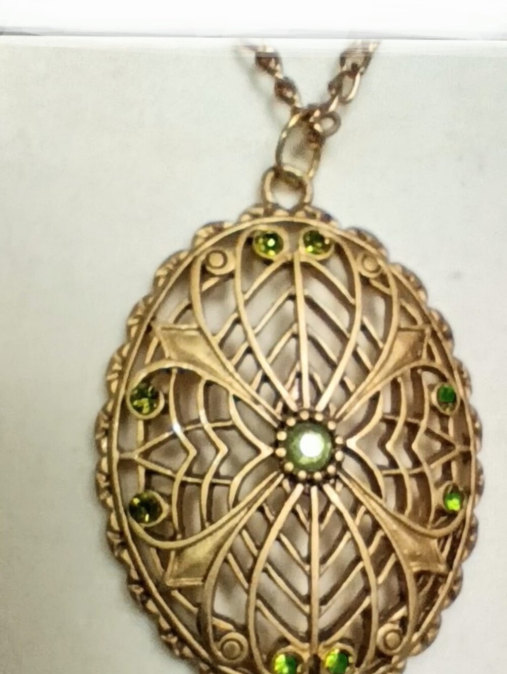 Brass Oval Filigree Pendant Open-work w/ Peridot Green Gemstones Miriam Haskell